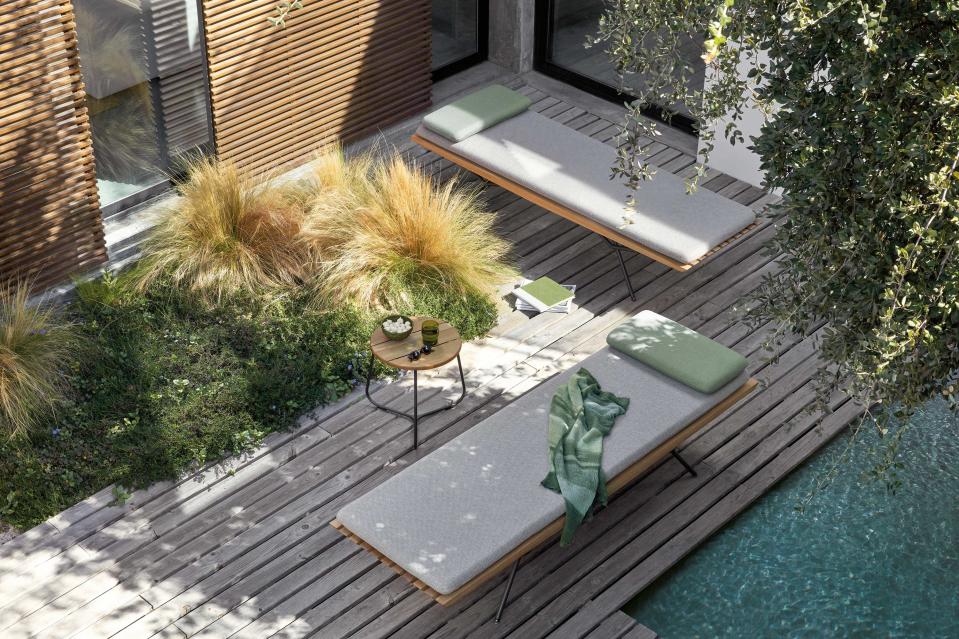 Use pared-back sun loungers for a chilled out spot