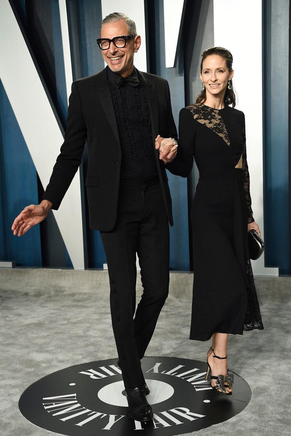 Jeff Goldblum and his wife, Emilie Livingston, wear all-black to the Vanity Fair Oscars Party. 