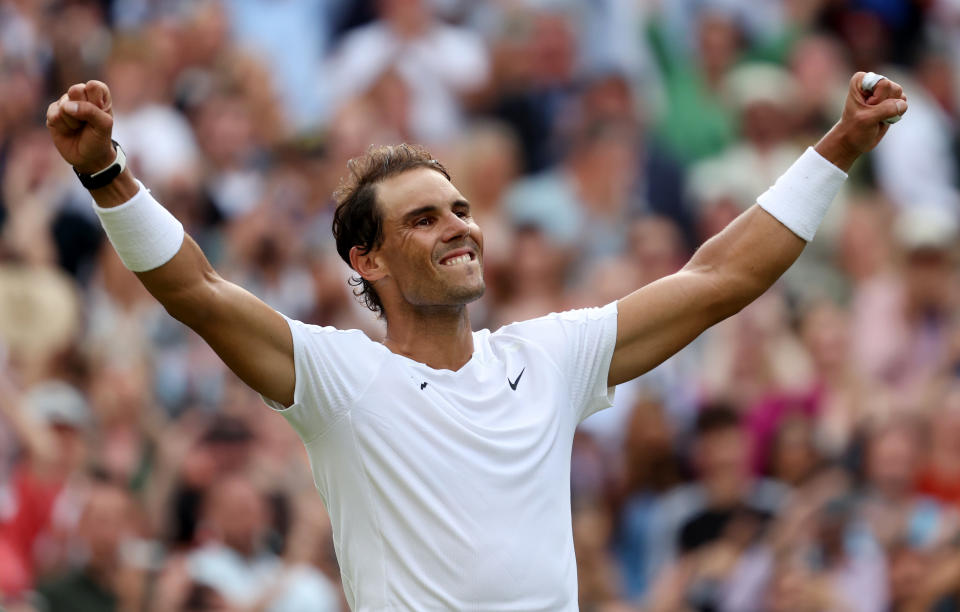 LONDON, ENGLAND - JULY 06: Rafael Nadal of Spain celebrates winning match point against Taylor Fritz of The United States during their Men's Singles Quarter Final match on day ten of The Championships Wimbledon 2022 at All England Lawn Tennis and Croquet Club on July 06, 2022 in London, England. (Photo by Clive Brunskill/Getty Images)