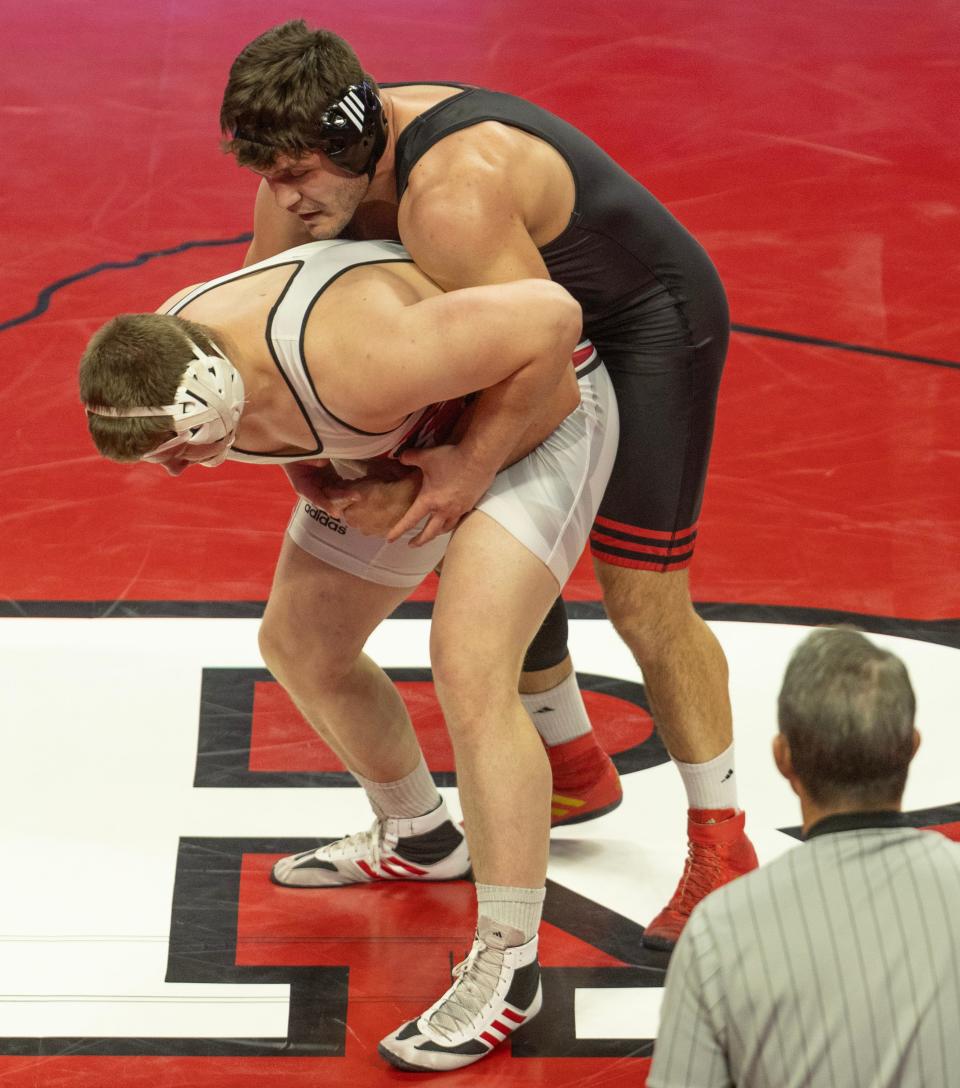 Rutgers, with heavyweight Yaraslau Slavikouski (top) as one if three unbeaten wrestlers in its lineup, will wrestle at Michigan State and Michigan Friday night and Sunday afternoon respectively.