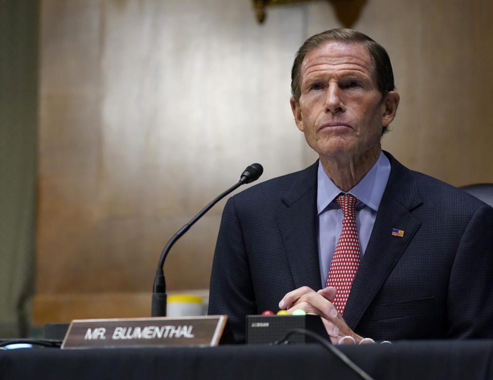 FILE- In this Nov. 10, 2020 file photo, Sen. Richard Blumenthal, D-Conn., speaks during a Senate Judiciary Committee hearing on Capitol Hill in Washington. Blumenthal and Connecticut Sen. Chris Murphy will be self-isolating after a member of Connecticut Gov. Ned Lamont's staff tested positive for COVID-19. Both tweeted on Saturday, Nov. 14, 2020, that they had not had close contact with the staffer but were taking the step out of an abundance of caution. (AP Photo/Susan Walsh, Pool, File)