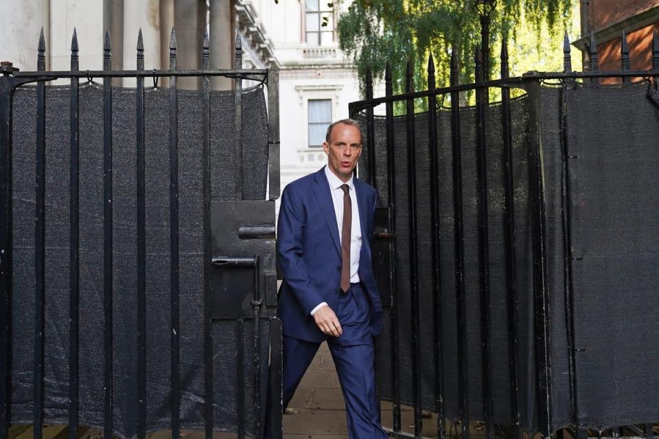 Dominic Raab came under fire for being on holiday amid a crisis on his watch, with criminal barristers voting for an all-out strike as he was on leave (Stefan Rousseau/PA) (PA Wire)