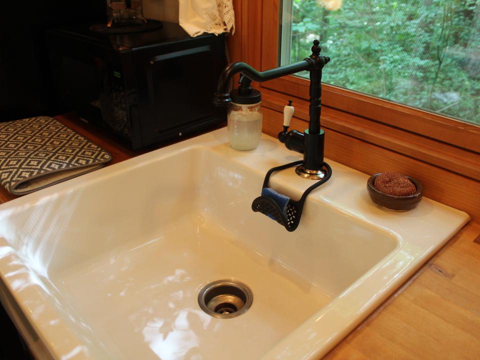 the kitchen sink inside the tiny house