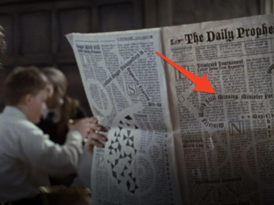 arrow pointing to a curvy headline on the daily prophet newspaper in harry potter and the goblet of fire