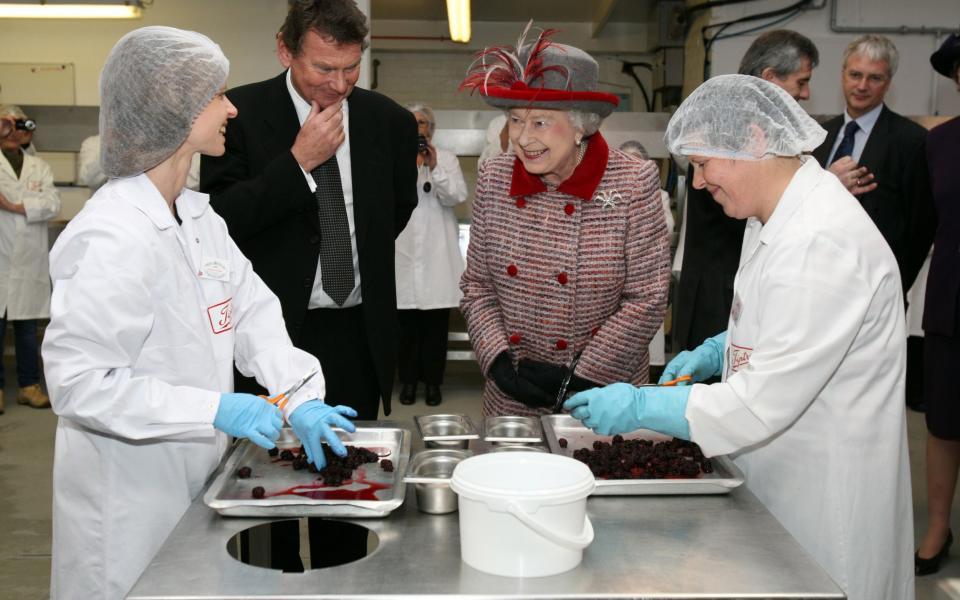  Queen Elizabeth II during a tour of the Wilkin and Son's Jam factory in Tiptree - Alpha Press