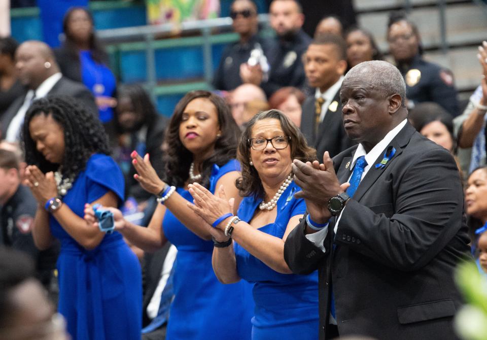 June 18, 2022; Tuscaloosa, AL, USA; Tuscaloosa honored the passing of Meridian Police Officer Kennis Croom, a native of Tuscaloosa, with a memorial service at Shelton State Community College. Tears stream down Rev. Kelvin Croom’s face as he and his wife Tracy join in singing praise songs during the Celebration of Life ceremony for their son. Gary Cosby Jr.-The Tuscaloosa News
