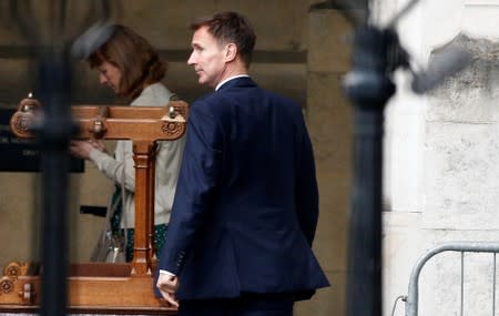 Jeremy Hunt, leadership candidate for Britain's Conservative Party, walks near the Houses of Parliament in London