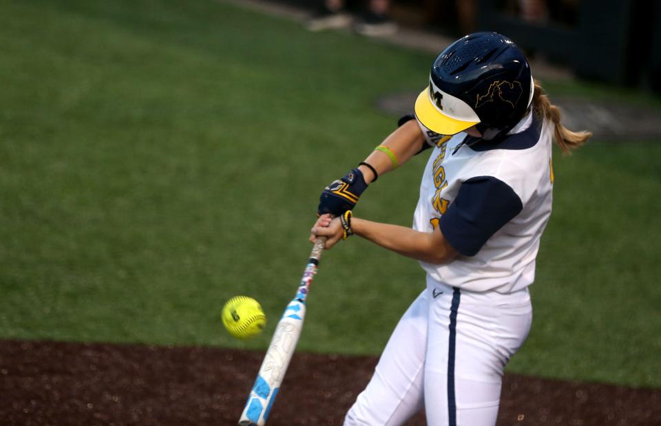 Michigan’s Ellie Sieler, a Monroe High graduate, swings at a pitch during the Big Ten softball tournament Friday, May 10, 2024 in Iowa City, Iowa.