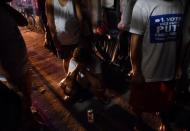 A relative of a victim cries behind the police line at the site of a drug-related shooting by unidentified men riding on motorcycles at Navotas city in metro Manila, Philippines June 19, 2017. REUTERS/Dondi Tawatao