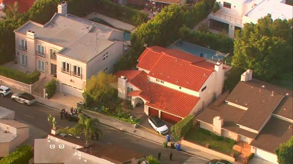 File -  In this Feb. 19, 2020, aerial image taken from video provided by Fox11 News KTTV-TV shows the Hollywood Hills home where rapper Pop Smoke was fatally shot (Fox11 News KTTV-TV)