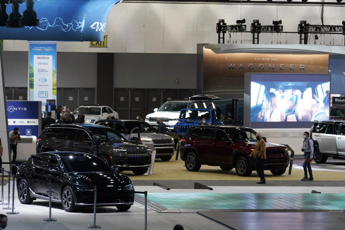 Cars from various automakers are displayed at the AutoMobility LA auto show Wednesday, Nov. 17, 2021, in Los Angeles. (AP Photo/Marcio Jose Sanchez)