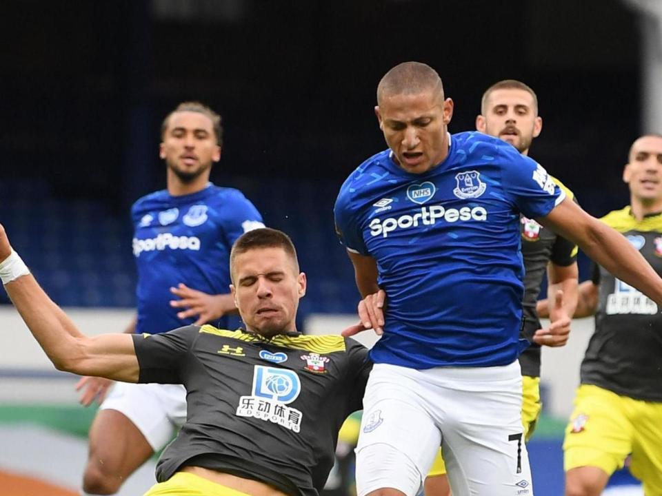 Everton goalscorer Richarlison battles for the ball: Getty Images
