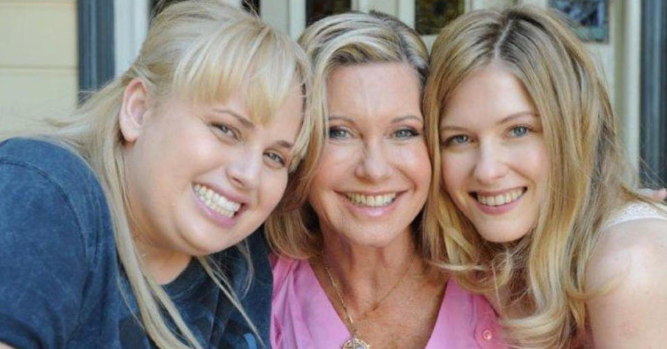 Rebel Wilson, Olivia Newton John and another cast member from their film 