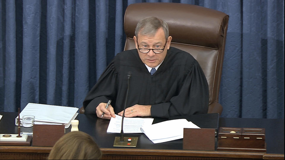 In this image from video, presiding officer Supreme Court Chief Justice John Roberts speaks during the impeachment trial against President Donald Trump in the Senate at the U.S. Capitol in Washington, Tuesday, Jan. 21, 2020. (Senate Television via AP)