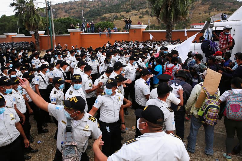 Hondurans take part in a new caravan of migrants, set to head to the United States, in Vado Hondo