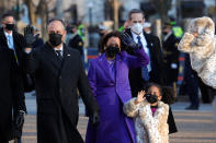 <p>Vice President Harris and her husband, first-ever Second Gentleman Doug Emhoff, wave to the pared-down crowd alongside Harris' great niece. </p>