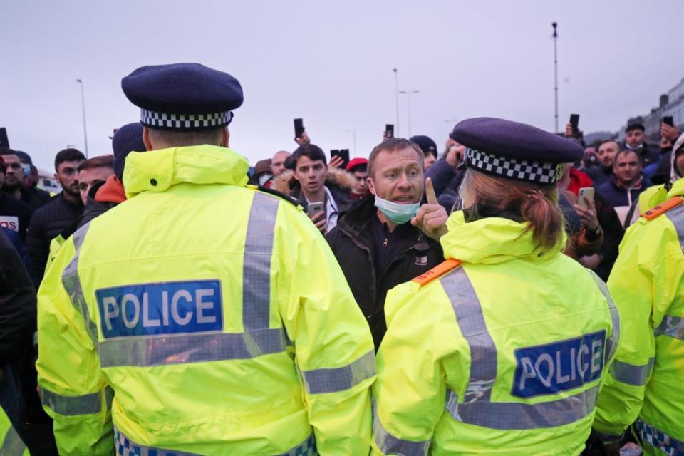 Police holding back drivers trying to enter the Port of Dover in Kent (Steve Parsons/PA) (PA Wire)