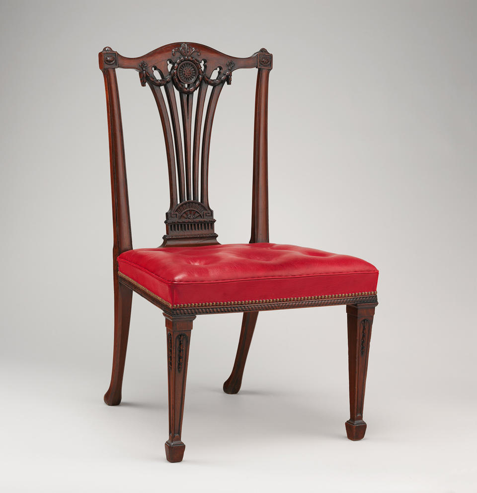 This photo provided by The Metropolitan Museum of Art shows a Side chair from the workshop of Thomas Chippendale. The chair is featured in the exhibit "Chippendale's Director: The Designs and Legacy of a Furniture Maker," which runs through Jan. 27, 2019, at the museum in New York. (The Metropolitan Museum of Art via AP)