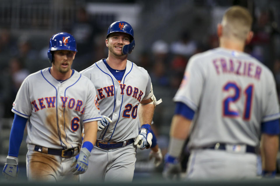 Jun 18, 2019; Atlanta, GA, USA; New York Mets first baseman Pete Alonso (20) celebrates after a home run with second baseman Jeff McNeil (6) and third baseman Todd Frazier (21) against the Atlanta Braves in the fourth inning at SunTrust Park. Mandatory Credit: Brett Davis-USA TODAY Sports