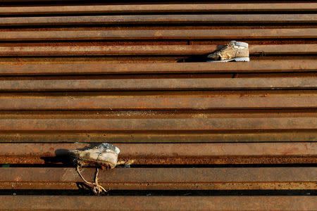 A pair of shoes lie on railway tracks in Tenosique, Tabasco, Mexico, April 11, 2017. REUTERS/Carlos Jasso