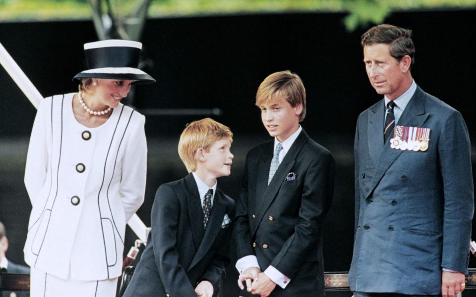 Princess Diana and Prince Charles with their children William and Harry  - AFP