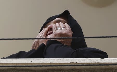 A relative of Palestinian fisherman Tawfiq Abu Reyala, 34, whom medics said was killed by Israeli navy, mourns during his funeral at Shatti refugee camp in Gaza City March 7, 2015. REUTERS/ Suhaib Salem