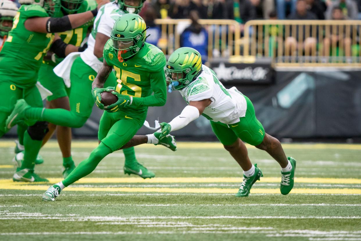 Oregon Green Team wide receiver Tez Johnson carries the ball during the Oregon Ducks’ spring game Saturday, April 27, 2024 at Autzen Stadium in Eugene, Ore.