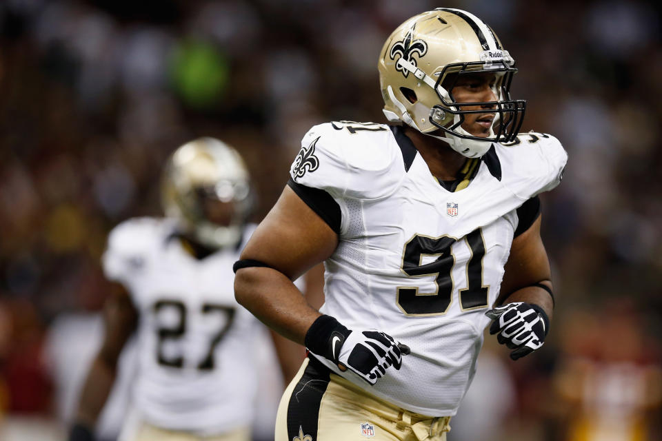 NEW ORLEANS, LA - SEPTEMBER 09:   Will Smith #91 of the New Orleans Saints walks off the field after a play against the Washington Redskins  at Mercedes-Benz Superdome on September 9, 2012 in New Orleans, Louisiana.  (Photo by Chris Graythen/Getty Images)