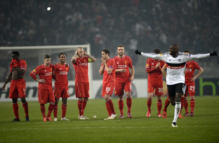 Liverpool players react after being knocked out of the Europa League at the round of 32 stage by Besiktas in Istanbul on February 26, 2015