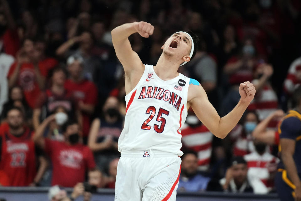 Arizona guard Kerr Kriisa reacts after scoring against California during the first half of an NCAA college basketball game, Saturday, March 5, 2022, in Tucson, Ariz. (AP Photo/Rick Scuteri)