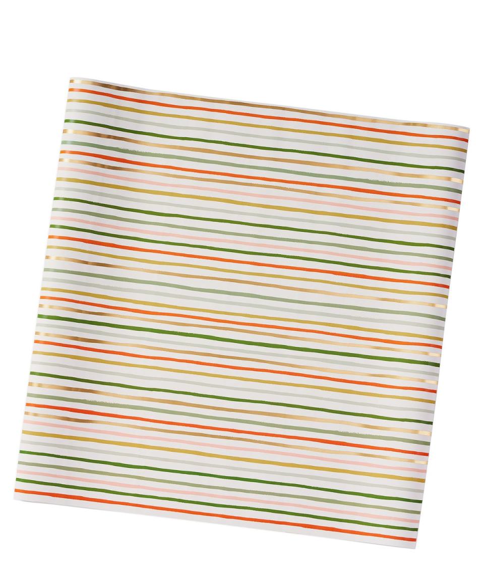 <p>Stripes are always in fashion, even when it comes to Christmas wrapping paper. The festive green, gold, silver and burnt orange lines that make up this design by American stationery brand Rifle Paper Co will suit more understated styles. £12.95 per roll, <a href="https://www.libertylondon.com/uk/festive-stripe-roll-wrap-000741510.html" rel="nofollow noopener" target="_blank" data-ylk="slk:libertylondon.com;elm:context_link;itc:0;sec:content-canvas" class="link ">libertylondon.com</a></p>