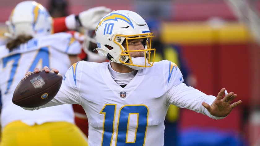 Los Angeles Chargers quarterback Justin Herbert (10) during the first half of an NFL football game against the Kansas City Chiefs, Sunday, Jan. 3, 2021, in Kansas City, Mo. (AP Photo/Reed Hoffmann)