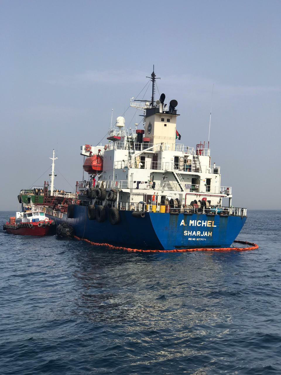 This photo provided by the United Arab Emirates' National Media Council shows the Emirati-flagged bunkering tanker A. Michel off the coast of Fujairah, United Arab Emirates, Monday, May 13, 2019. Two Saudi oil tankers and a Norwegian-flagged vessel were damaged in what Gulf officials described Monday as a "sabotage" attack off the coast of the United Arab Emirates. While details of the incident remain unclear, it raised risks for shippers in a region vital to global energy supplies at a time of increasing tensions between the U.S. and Iran over its unraveling nuclear deal with world powers. (United Arab Emirates National Media Council via AP)