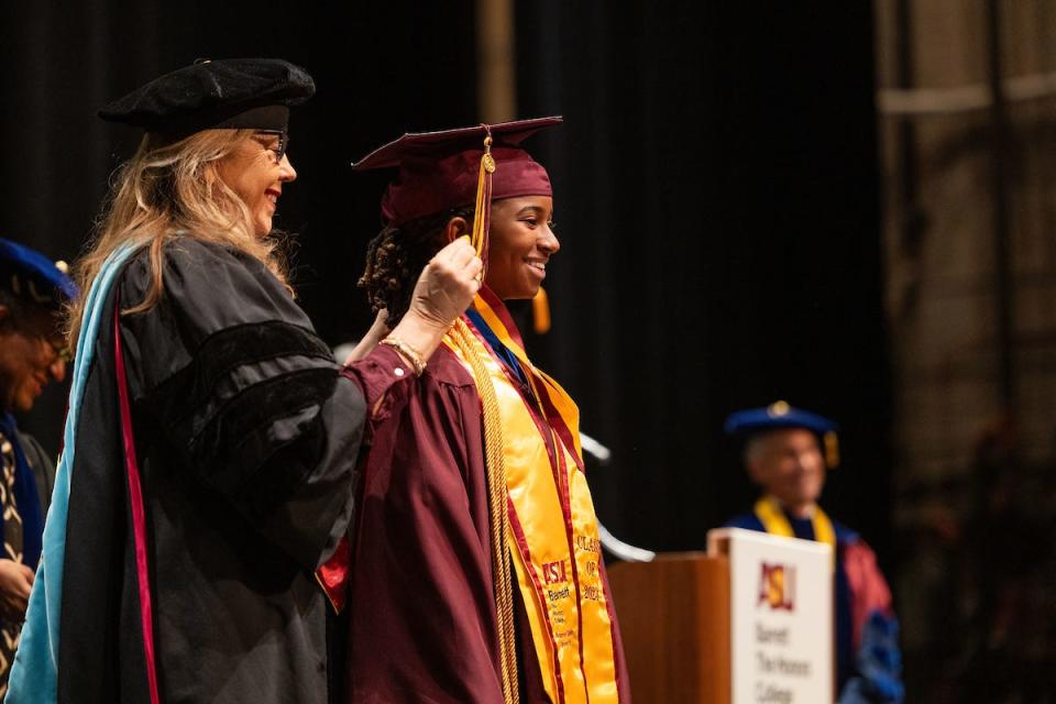 Alena McQuarter, 15, on stage at Arizona State University's Barrett Honors College convocation on Monday, Dec. 11, 2023.