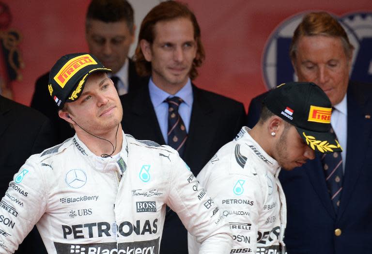 Nico Rosberg (left) and Lewis Hamilton (right) on the podium after the Monaco Formula One Grand Prix