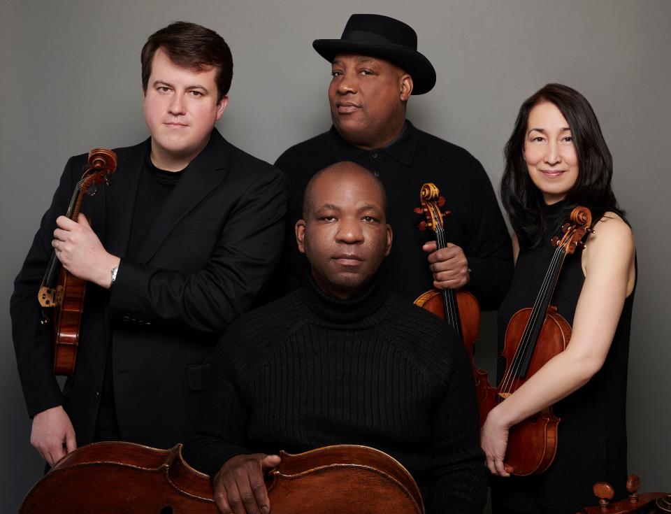 Members of the Harlem Chamber Players: From left, in the back, violist William Frampton, violinist Ashley Horne and violinist Claire Chan. Seated is cellist Wayne Smith.