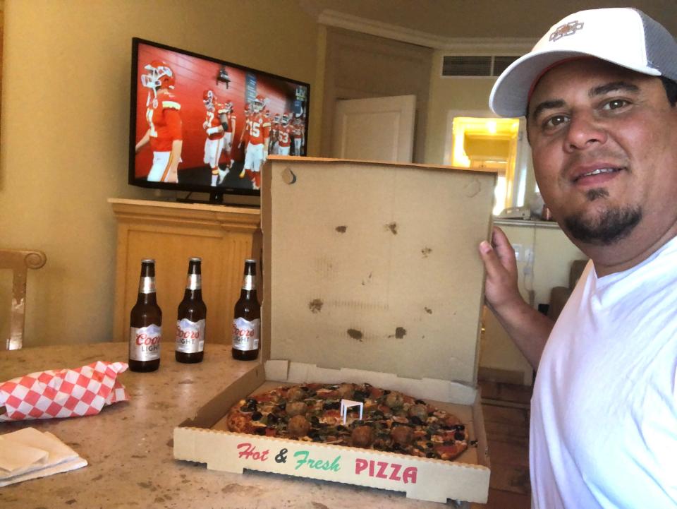 Antonio Delgado ordered in pizza for his Super Bowl party of one in his hotel room in Cabo San Lucas, Mexico. He tested positive for COVID-19 during the trip and had to isolate and delay his return home.