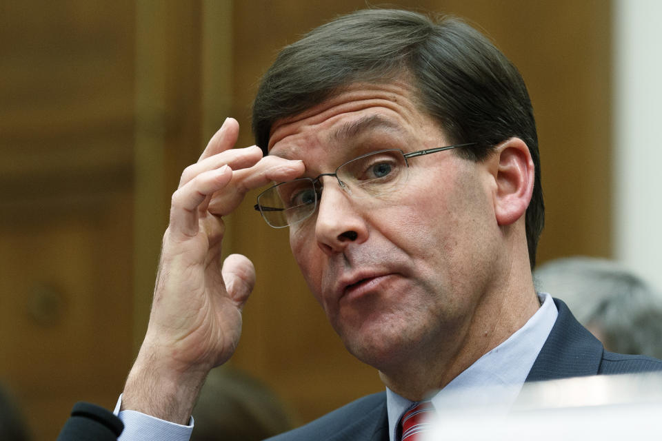 Secretary of Defense Mark Esper testifies to a House committee hearing on U.S. policy in Syria, Wednesday, Dec. 11, 2019, on Capitol Hill in Washington. (AP Photo/Jacquelyn Martin)