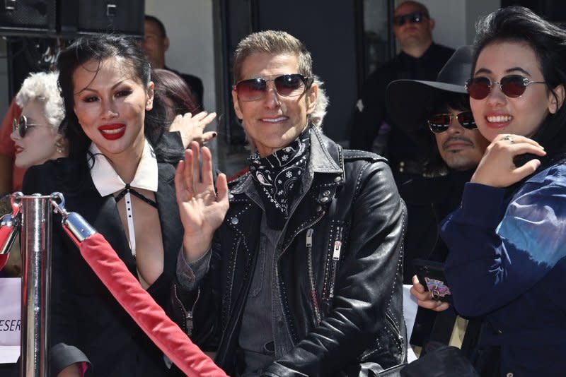 Perry Farrell (C) attends the Smashing Pumpkins' TCL Chinese Theatre hand and footprint ceremony in 2022. File Photo by Jim Ruymen/UPI