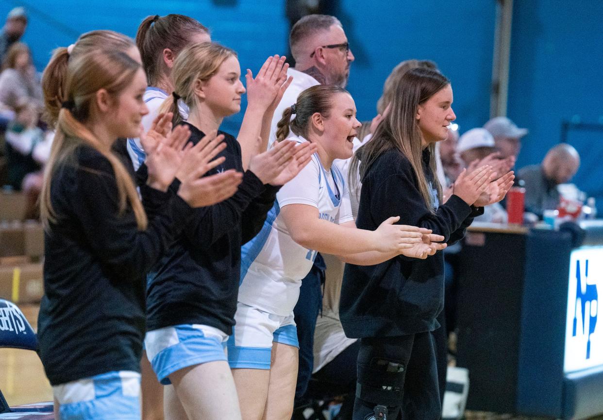 North Penn's bench cheer on their team as they play against Emmaus in the first round of the PIAA Class 6A girls’ basketball tournament in Lansdale on Friday, Mar.8, 2024.