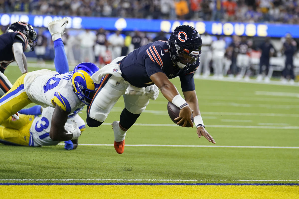 USA. 16th Aug, 2021. Chicago Bears quarterbacks Andy Dalton and Justin  Fields talk on the sideline in the fourth quarter against the Miami  Dolphins in the preseason opener at Soldier Field on