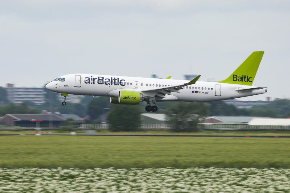 Air Baltic Airbus A220-300 aircraft as seen on final approach flying, landing and touching down at Amsterdam Schiphol International Airport in the Netherlands, on July 2, 2020. The new modern and advanced airplane has the reistration YL-CSN, the name Sigulda and is powered by 2x PW jet engines. AirBaltic BT BTI is the flag carrier of Latvia and is operating from the Latvian capital Riga an all Airbus A220 fleet, the former Bombardier CS300. he company temporarily suspended operations on 17 March 2020 due to the Covid-19 coronavirus pandemic with the quarantine and lockdown measures and flights only restarted on a limited basis from 18 May 2020. (Photo by Nicolas Economou/NurPhoto via Getty Images)