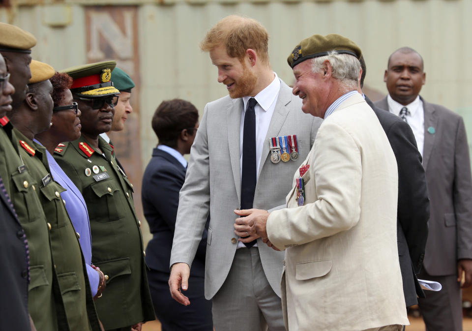 FILE - In this Nov. 27, 2018 file photo, Britain's Prince Harry arrives at the Burma Barracks for a meeting with war veterans and widows in Lusaka. Amid the fanfare marking the 100th anniversary of the end of World War I, little has been said about some crucial participants in the conflict: Africans. More than 1 million African soldiers, laborers and porters were vital actors in the war in Europe and especially in battles on the African continent, yet little commemorates their role. (AP Photo/Tsvangirayi Mukwazhi, File)