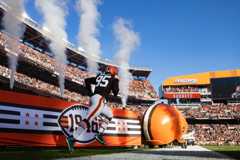 Cleveland Browns defensive end Myles Garrett runs onto the field for player introductions before a Week 14 game against the Baltimore Ravens.