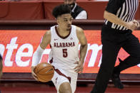 Alabama guard Jaden Shackelford dribbles during the second half of the team's NCAA college basketball game against Auburn on Tuesday, March 2, 2021, in Tuscaloosa, Ala. (AP Photo/Vasha Hunt)