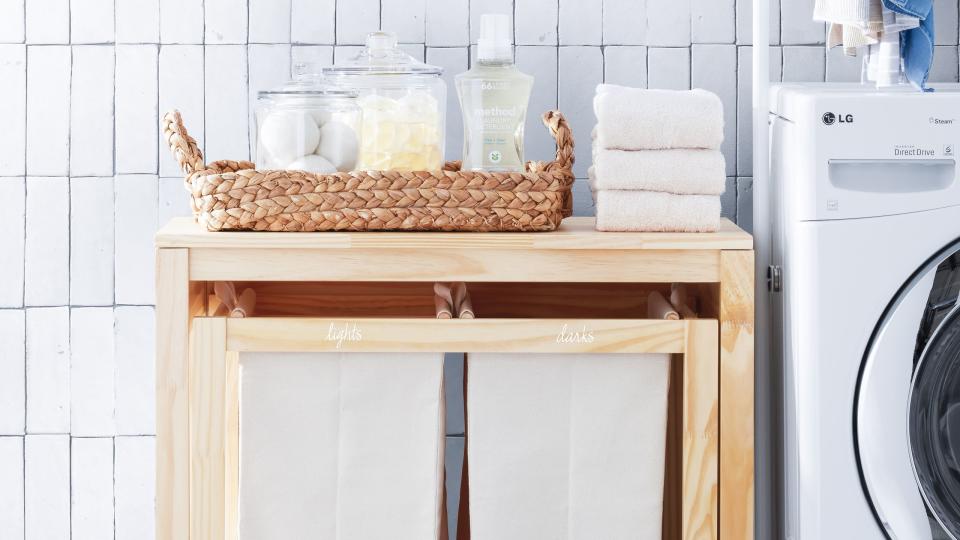 an image of a laundry room from stay organized by the home edit