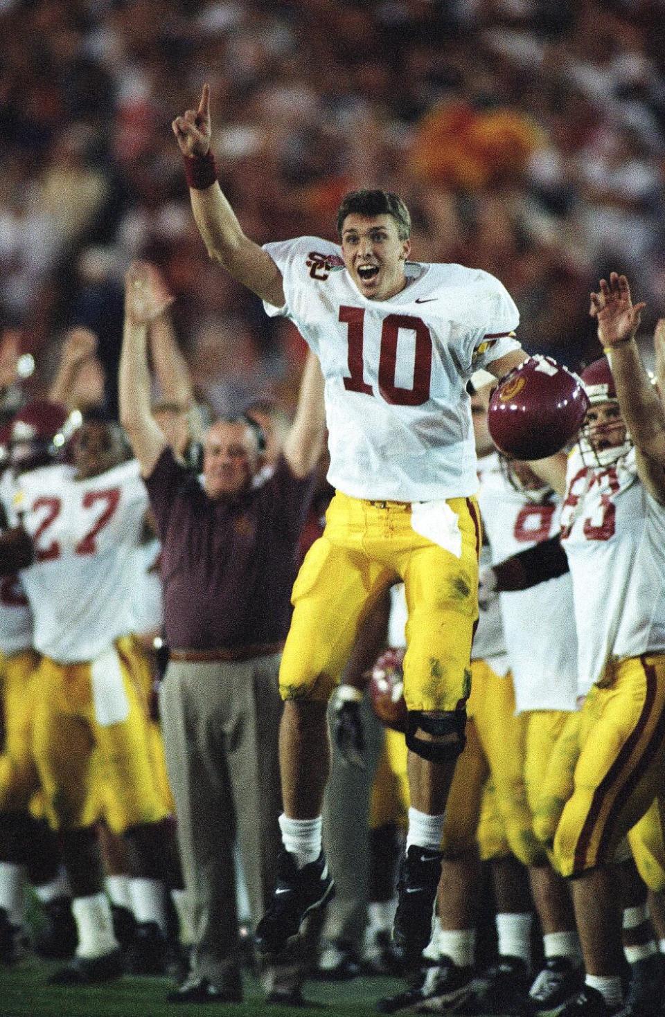 USC quarterback Brad Otton (10) celebrates on the sidelines after the Trojans defeated Northwestern in the Rose Bowl
