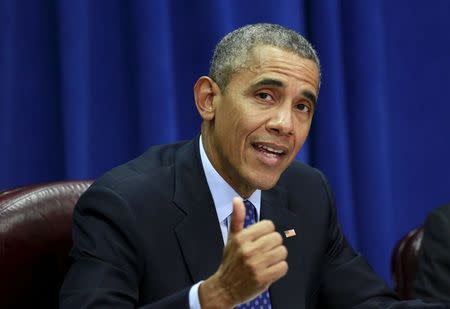 U.S. President Barack Obama speaks during a meeting with agriculture and business leaders about the Trans-Pacific Partnership at the Department of Agriculture in Washington October 6, 2015. REUTERS/Kevin Lamarque