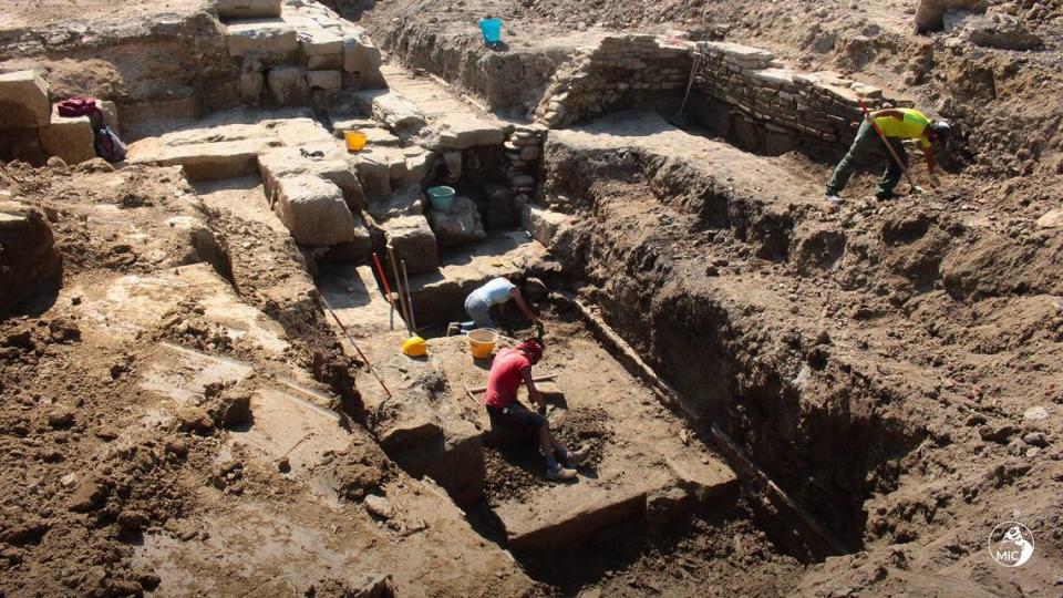 Archaeologists said they discovered a marble podium and water drainage system.