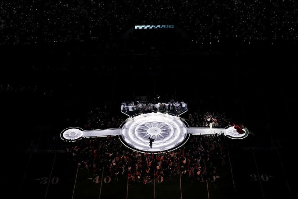 Usher and Alicia Keys perform onstage during the halftime show.